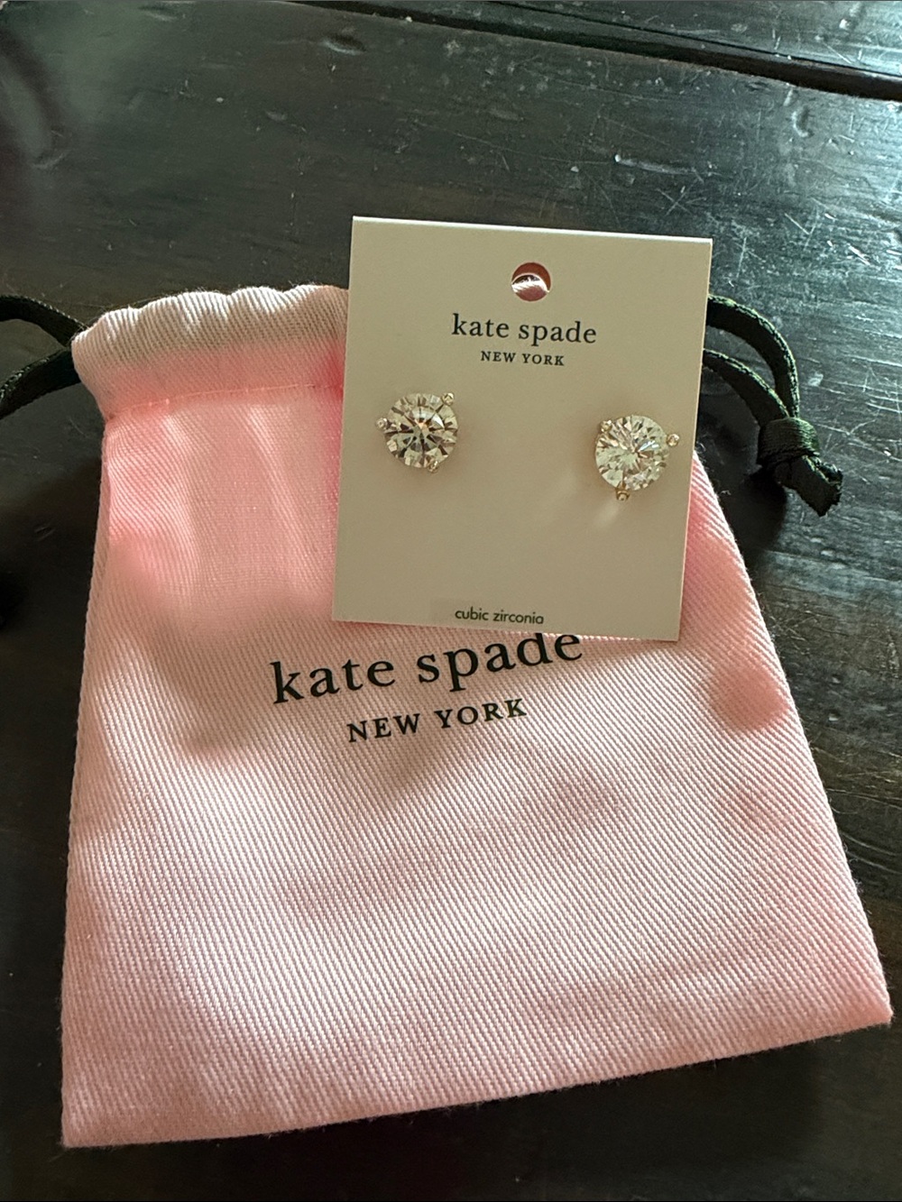 kate spade Pink Drawstring Pouch with Clear Cubic Zirconia Studs